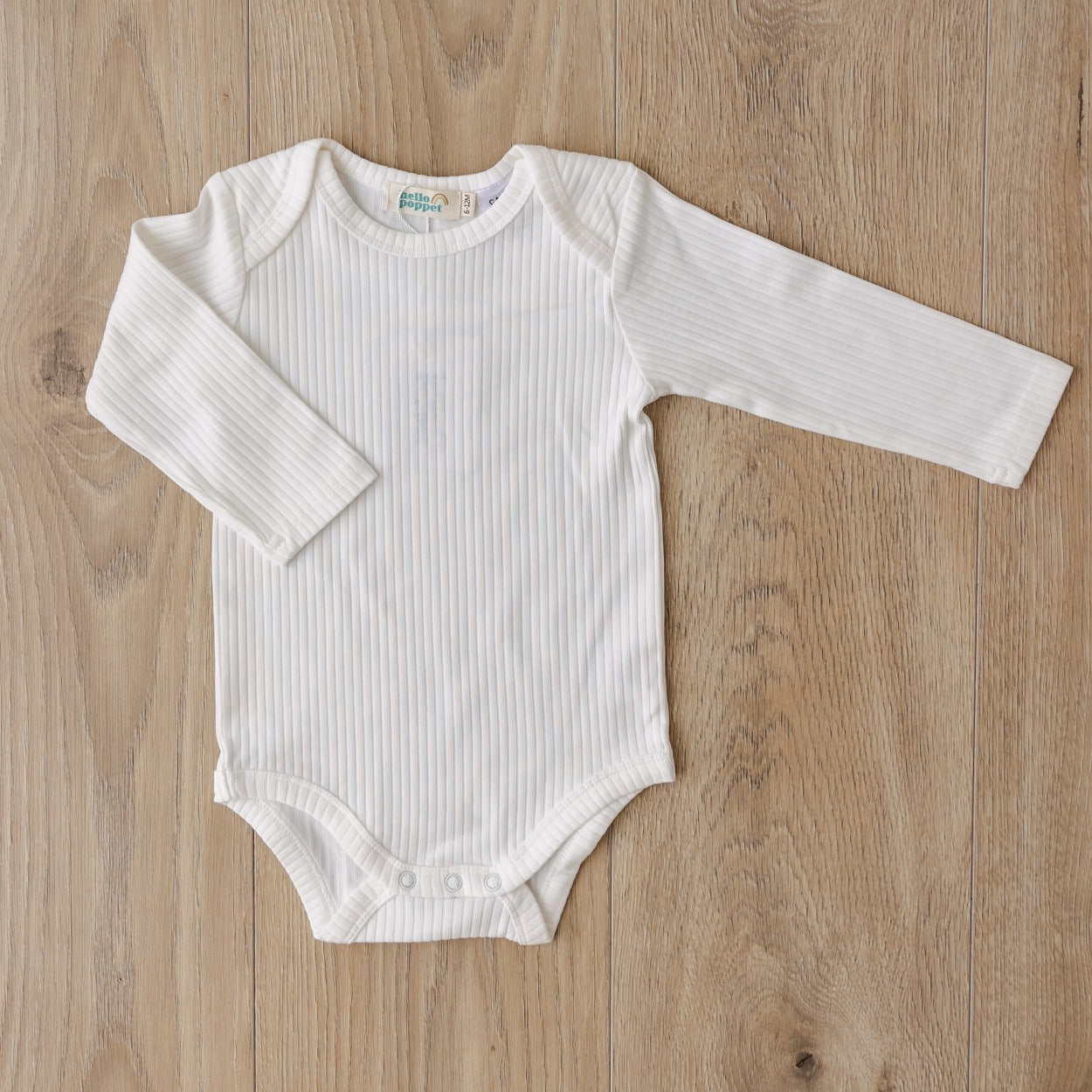 Hello Poppet Original Ribbed Bodysuit | Longsleeve in White available at Bear & Moo