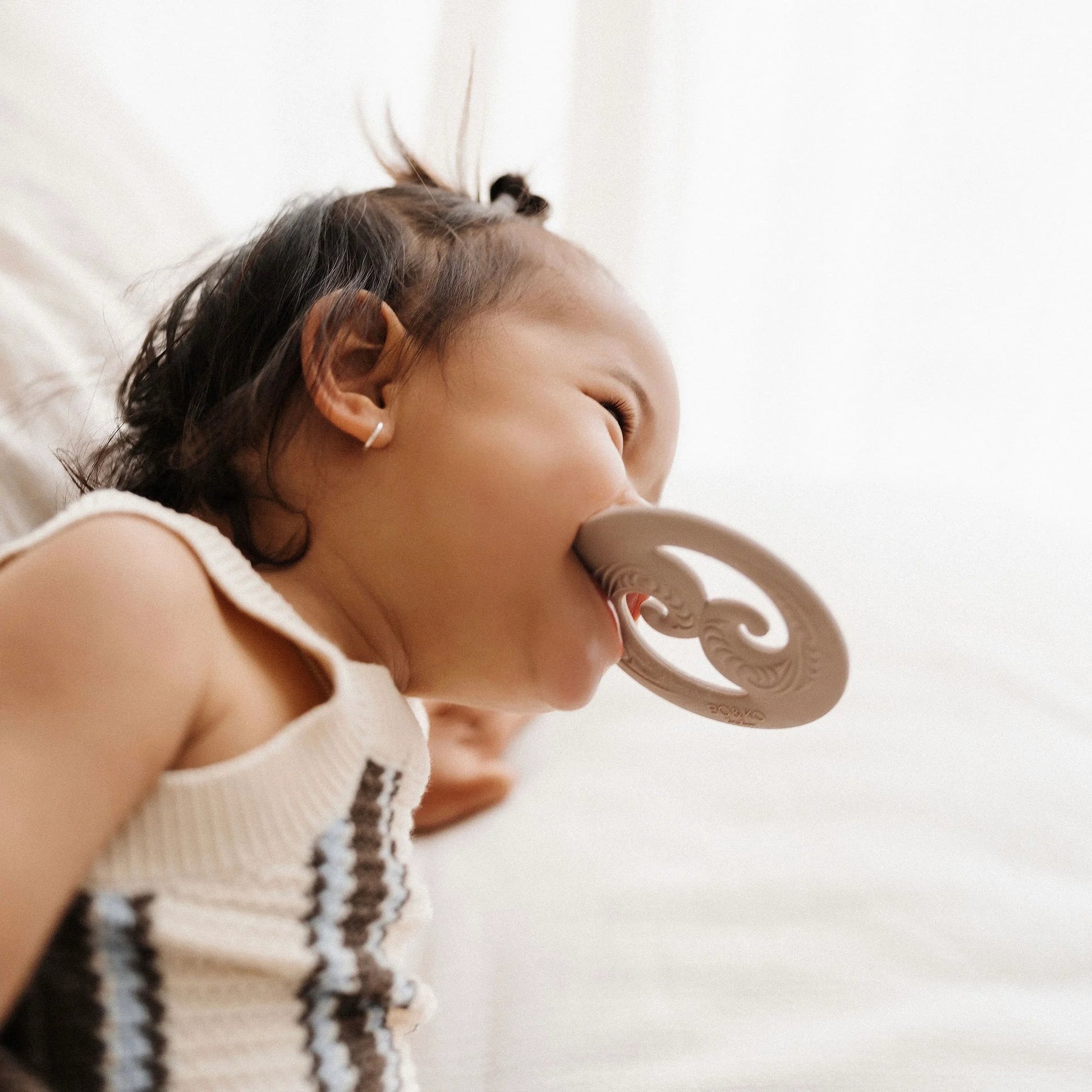 BO & KO Baby Koru Teether in Latte available at Bear & Moo