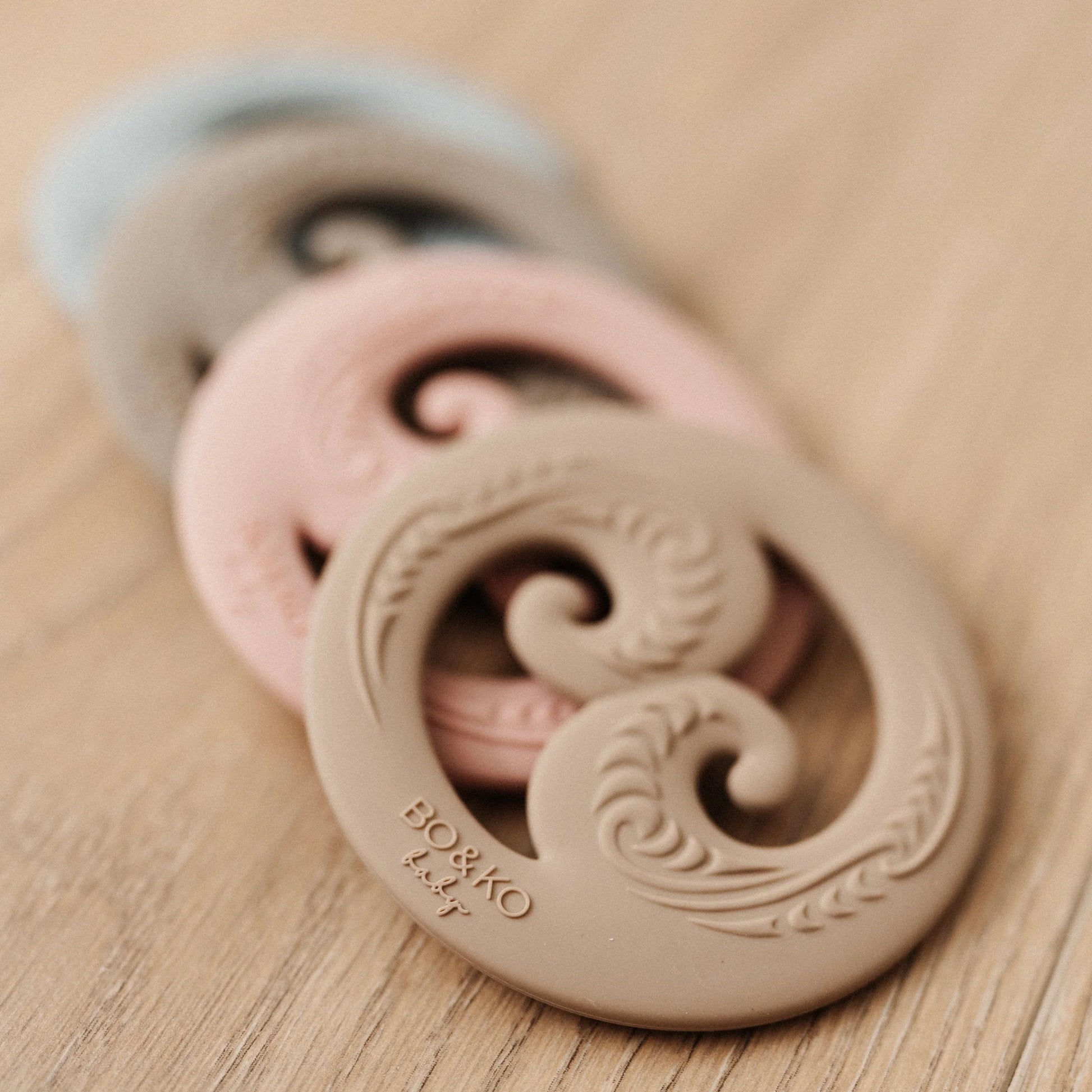 BO & KO Baby Koru Teether in Latte available at Bear & Moo
